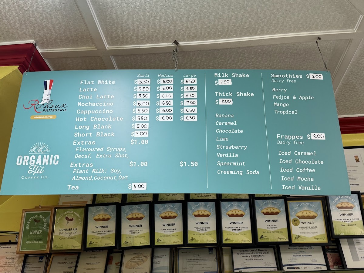 Richoux menu board with coffee, smoothies, shakes, and pie awards